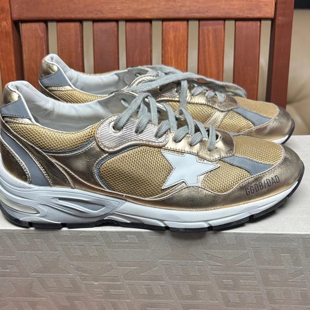Golden Goose Dad Star Gold Leather and mesh Sneakers - Picture 1 of 6